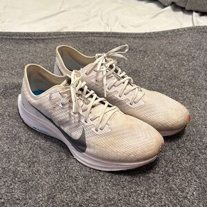 Nike White and Gray Athletic Shoes with Streamlined Design